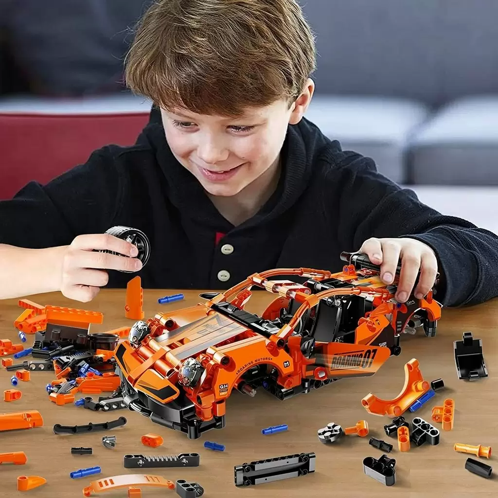 Set de construcție XTech Pull Back Orange Racer 588 pcs